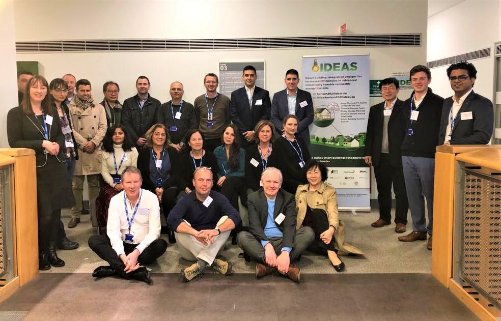 Group photograph of the attendees at the IDEAS partners meeting in Belfast in November 2019. Partners represented are: Ulster University, Trinity College Dublin, University of Ferrara, Institute Mihailo Pupin, Mayo County Council, University of Cagliari, National Laboratory of Energy and Geology Portugal, Energy Co-operatives Ireland, Power Capital, LEITAT Technological Center, Phase Change Material Products Ltd, Portuguese Association of PV Enterprises, LF Fasthouse, and APK Architects Ltd.